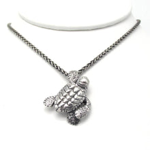 Load image into Gallery viewer, Handmade .925 Sterling silver Loggerhead Sea Turtle pendant on .925 Sterling wheat chain with a lobster clasp  We donate a portion of all WildWhere sales to support continuing wildlife conservation efforts!
