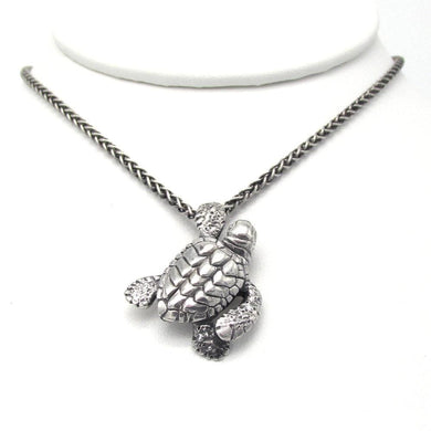 Handmade .925 Sterling silver Loggerhead Sea Turtle pendant on .925 Sterling wheat chain with a lobster clasp  We donate a portion of all WildWhere sales to support continuing wildlife conservation efforts!