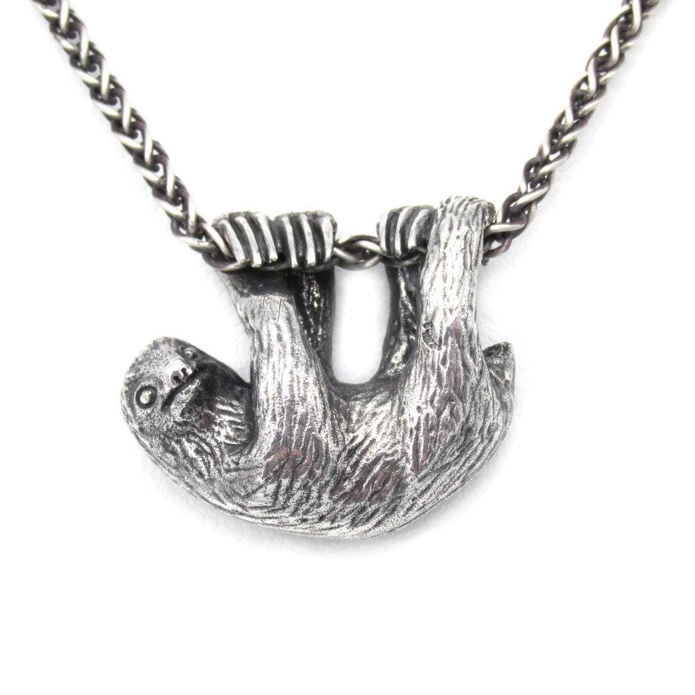 Our charming Three-Toed Sloth hangs happily from a lovely wheat chain, happy to watch the world from a safe perch around your neck! With life-like detail and cuteness to spare, your new silver pal is sure to draw lots of compliments!  We donate a portion of all WildWhere sales to support continuing wildlife conservation efforts!